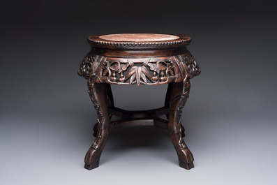A Chinese marble-topped hongmu stand, 19/20th C.