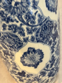 A Chinese blue and white rouleau vase with floral design, Kangxi