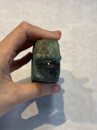 Seven various Chinese bronze and cast-iron bells, Han and later