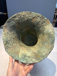 A Chinese archaic bronze ritual wine vessel with Taotie design, 'Zun 尊', Shang