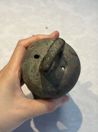 Seven various Chinese bronze and cast-iron bells, Han and later