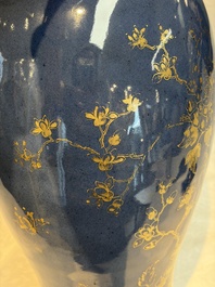 A Chinese gilt-decorated powder-blue-ground 'Phoenix among Blossoming Branches' vase, Qianlong