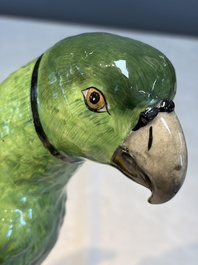 A German polychrome 'Parrot on Tree Stump' sculpture, SP Dresden mark, 20th C.