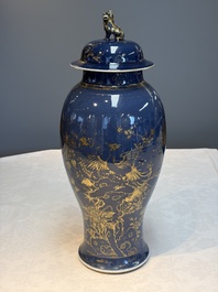 A Chinese gilt-decorated powder-blue-ground 'Phoenix among Blossoming Branches' vase, Qianlong