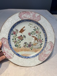 Two Chinese famille rose 'Magpie and Peony' plates with bianco-sopra-bianco rims, Yongzheng