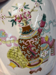 A Chinese famille rose 'Antiquities' vase and a covered jar, 19th C.