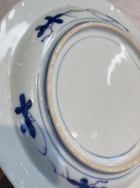 A pair of Chinese blue and white 'Scheveningen' or 'Nabeshima' plates, Kangxi/Yongzheng