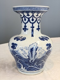 A Chinese blue and white 'Bats and Rocks among Cresting Waves' vase, Qianlong