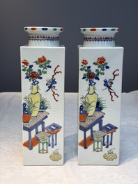 A pair of Chinese famille verte 'Antiquities' square vases, 19th C.