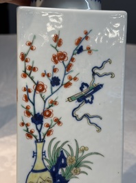A pair of Chinese famille verte 'Antiquities' square vases, 19th C.