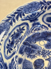 A pair of Chinese blue and white 'Klapmuts' bowls with deer design, Wanli