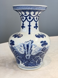 A Chinese blue and white 'Bats and Rocks among Cresting Waves' vase, Qianlong