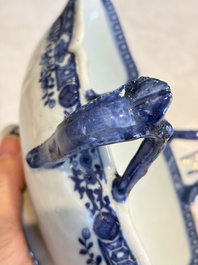 A pair of Chinese blue and white handled sauce boats and stands with pagodas along a river, Qianlong