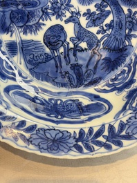 A pair of Chinese blue and white 'Klapmuts' bowls with deer design, Wanli
