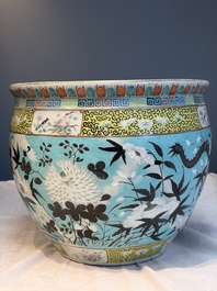 A Chinese famille rose turquoise-ground Dayazhai-style 'Dragons' fish bowl or jardini&egrave;re, 19th C.