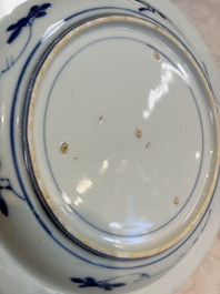 A pair of Chinese blue and white 'Scheveningen' or 'Nabeshima' plates, Kangxi/Yongzheng
