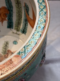 A Chinese famille rose green-ground 'Antiquities' fish bowl or jardini&egrave;re with applied relief design, 19th C.