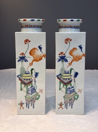 A pair of Chinese famille verte 'Antiquities' square vases, 19th C.