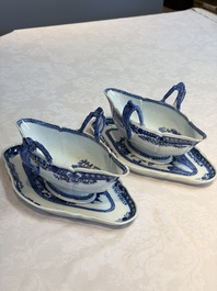 A pair of Chinese blue and white handled sauce boats and stands with pagodas along a river, Qianlong