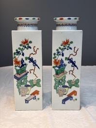 A pair of Chinese famille verte 'Antiquities' square vases, 19th C.