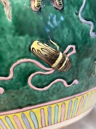 A Chinese famille rose green-ground 'Antiquities' fish bowl or jardini&egrave;re with applied relief design, 19th C.