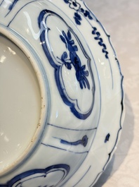 A pair of Chinese blue and white 'Klapmuts' bowls with deer design, Wanli