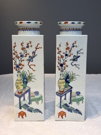 A pair of Chinese famille verte 'Antiquities' square vases, 19th C.