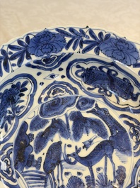 A pair of Chinese blue and white 'Klapmuts' bowls with deer design, Wanli