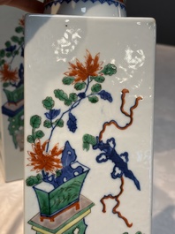 A pair of Chinese famille verte 'Antiquities' square vases, 19th C.