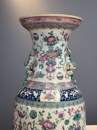 A pair of Chinese famille rose 'Antiquities' vases, 19th C.