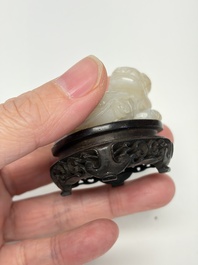 A Chinese carved jade 'Buddhist Lions' group, 19th C.