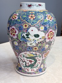 A Chinese famille rose 'Dragons' baluster vase and cover, Yongzheng/Qianlong