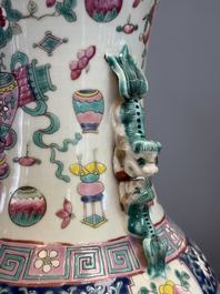A pair of Chinese famille rose 'Antiquities' vases, 19th C.