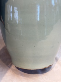 Two Chinese blue and white celadon-ground vases and a blue and white vase, on wooden stands, 19th C.