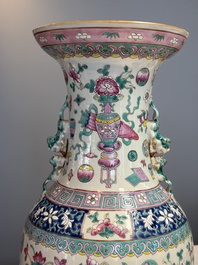 A pair of Chinese famille rose 'Antiquities' vases, 19th C.