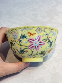 A Chinese famille rose sgraffito lemon-yellow-ground 'Flower Scrolls' bowl, Qianlong mark, 20th C.