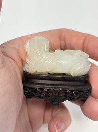 A Chinese carved jade 'Buddhist Lions' group, 19th C.