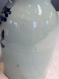 Two Chinese blue and white celadon-ground vases and a blue and white vase, on wooden stands, 19th C.