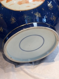 A large Chinese iron-red and gilt-decorated powder-blue-ground bowl with narrative design, 19th C.