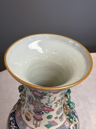 A pair of Chinese famille rose 'Antiquities' vases, 19th C.