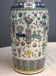 A pair of Chinese famille rose 'Antiquities' vases, 19th C.