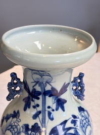 Two Chinese blue and white celadon-ground vases and a blue and white vase, on wooden stands, 19th C.