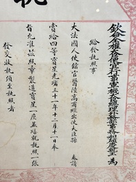 An imperial Chinese 'Order of the Double Dragon' award document, Guangxu, dated 1906