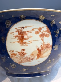 A large Chinese iron-red and gilt-decorated powder-blue-ground bowl with narrative design, 19th C.