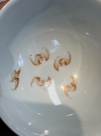 A Chinese famille rose sgraffito lemon-yellow-ground 'Flower Scrolls' bowl, Qianlong mark, 20th C.