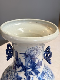 Two Chinese blue and white celadon-ground vases and a blue and white vase, on wooden stands, 19th C.