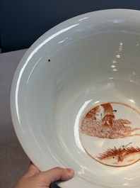 A large Chinese iron-red and gilt-decorated powder-blue-ground bowl with narrative design, 19th C.