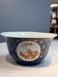 A large Chinese iron-red and gilt-decorated powder-blue-ground bowl with narrative design, 19th C.