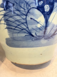 Two Chinese blue and white celadon-ground vases and a blue and white vase, on wooden stands, 19th C.