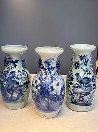 Two Chinese blue and white celadon-ground vases and a blue and white vase, on wooden stands, 19th C.